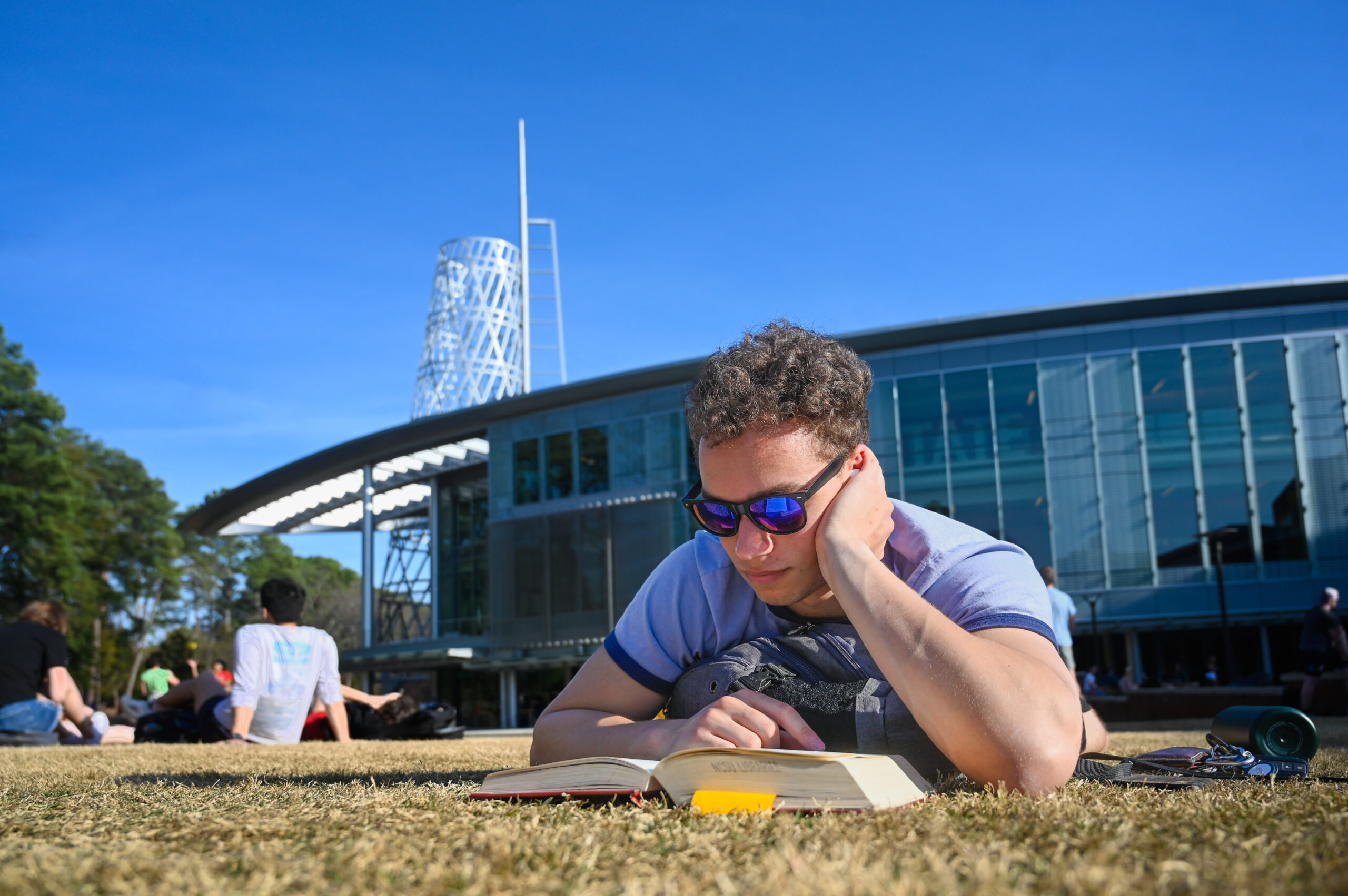 Students take to the area around Talley to enjoy a warm, almost-spring day. Photo by Marc Hall